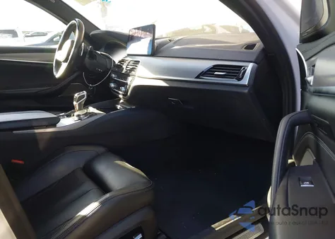 2021 BMW M5 z USA, uszkodzony, nr VIN WBS83CH09MCF39474